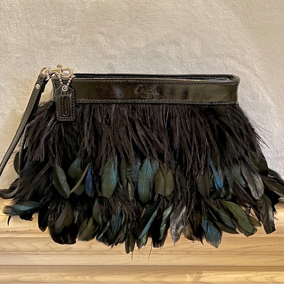 Coach Handbags - NWT Coach Occasion Feather Zip Clutch -- Special Ed.
